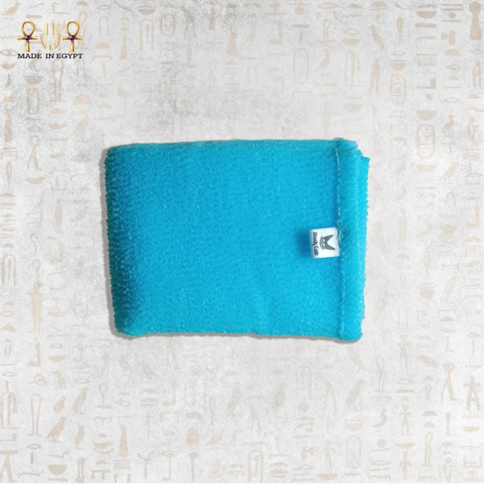 Close-up of Blue Deep Exfoliating Towel by Black Cat showing texture and brand label.