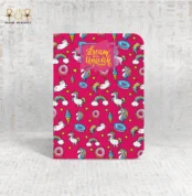Dream Unicorn notebook with a vibrant pink background featuring unicorns, rainbows, donuts, and ice cream illustrations.