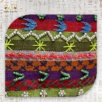 Detailed Embroidery of Colorful Geometric Stripes on Emerald Delight Handbag.