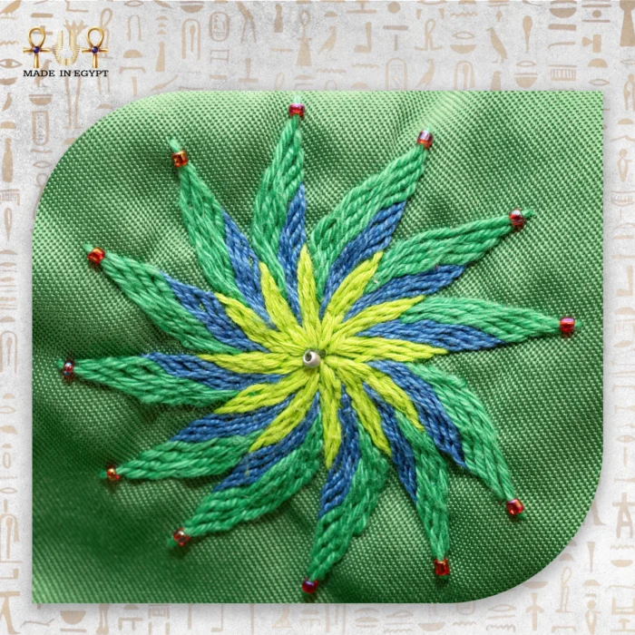 Close-Up of the Second Hand-Embroidered Flower Design on the Emerald Delight Handbag.