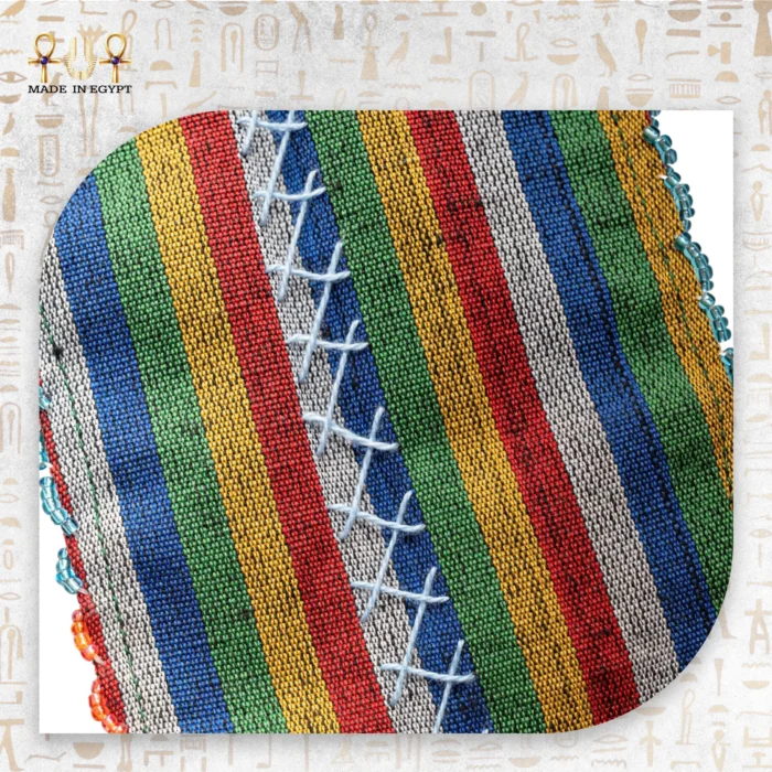 Multicolor striped woven handle of the Joy of Colors bag.