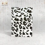 Black and white leopard print notebook with bold animal pattern, made in Egypt