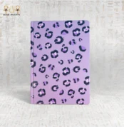 Purple leopard print notebook with playful and vibrant design, made in Egypt