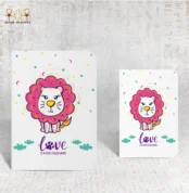 Lion Love notebook featuring a cute cartoon lion with a pink mane and playful background.
