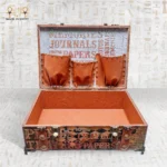 Interior of the Memories Box with leather pockets and storage space.