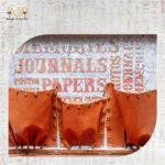 Close-up of interior leather pockets inside the handmade Memories Box for organizing papers and keepsakes.