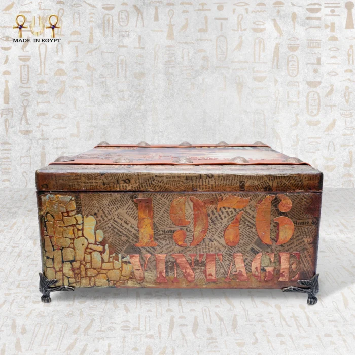 Back side of the handmade Memories Box featuring a vintage 1976 design with newspaper-style details.
