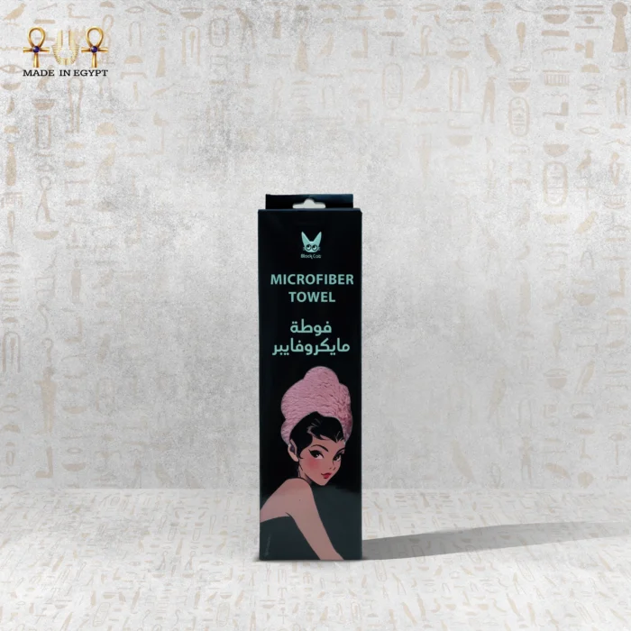 Microfiber Towel packaging with a classic illustration of a woman wearing a pink towel, featuring pink packaging. Made in Egypt.