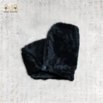 Soft, black microfiber towel folded with a button fastening.