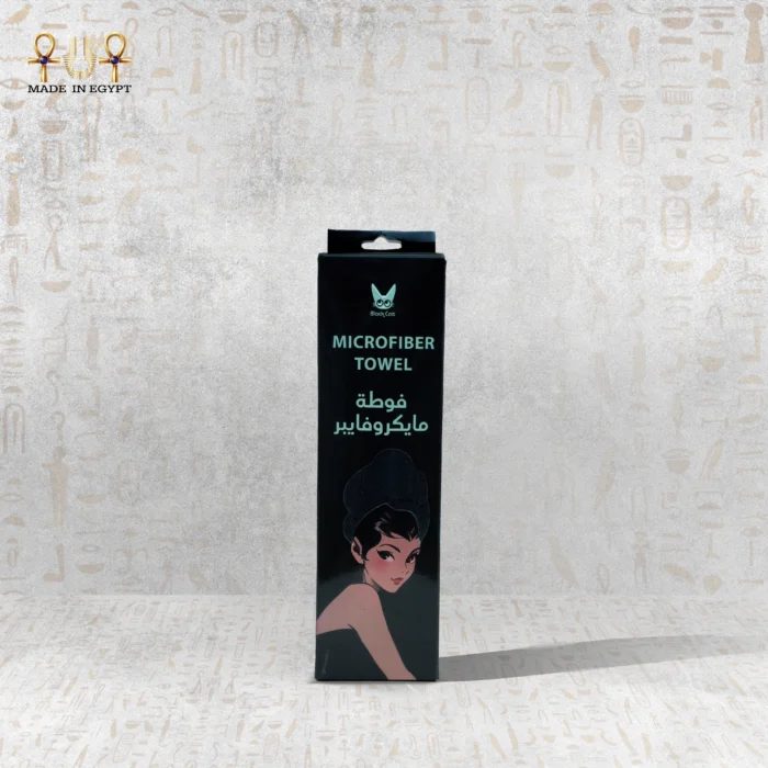 Microfiber Towel packaging with a chic woman illustration, showcasing black packaging. Made in Egypt.