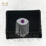 Close front view of the Mysterious Gaze bag featuring detailed purple beaded eye embroidery and silver dangling fringes.