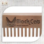 Close-up of BlackCat engraved Wooden Comb.