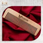 Natural Wooden Comb on satin fabric with BlackCat engraving.