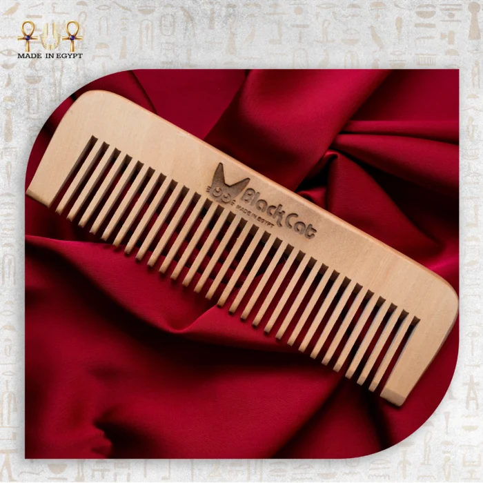 Natural Wooden Comb on satin fabric with BlackCat engraving.