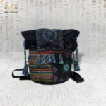 Night Delight handwoven embroidered bag featuring colorful intricate geometric designs and tassel details, showcasing unique Egyptian craftsmanship.