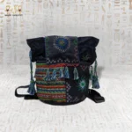 Night Delight handwoven embroidered bag featuring colorful intricate geometric designs and tassel details, showcasing unique Egyptian craftsmanship.