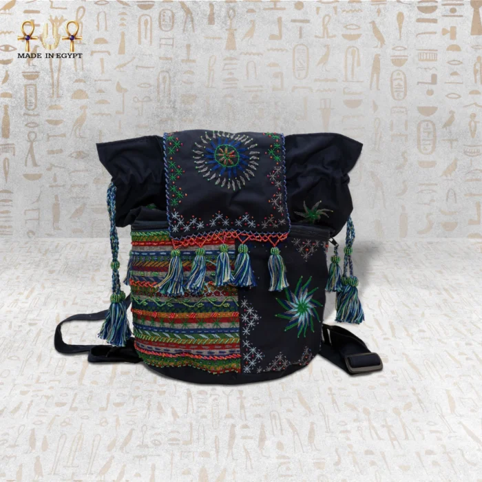 Night Delight handwoven embroidered bag featuring colorful intricate geometric designs and tassel details, showcasing unique Egyptian craftsmanship.