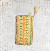 Nile Joy embroidered pouch with vibrant orange and green thread details.