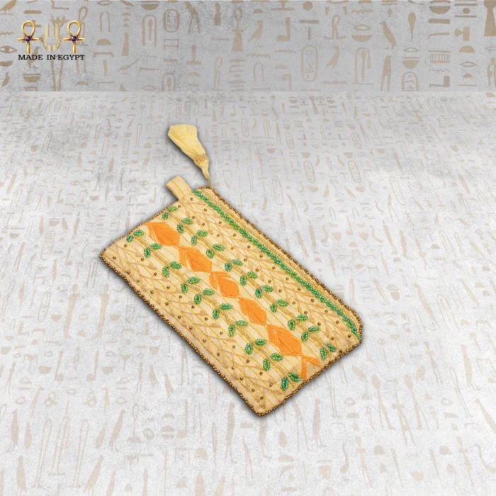 Side view of the Nile Joy embroidered pouch with intricate beading.