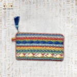 Nubian Delight pouch with intricate multi-colored embroidery, featuring red, blue, yellow, and green beads with a blue tassel.