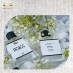 Fall in Peace perfume bottle with refined oud and leather notes