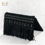 Side view of the Pharaoh’s Touch bag with black fringes, silver embellishments, and bold handcrafted details.