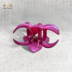 Pink flower-shaped clasp with a spring mechanism, viewed from the front.