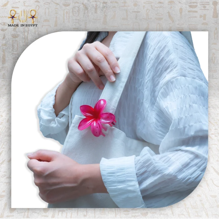 Pink Clasp attached to a fabric, showing how it enhances accessories.