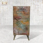 Rear view of the Royal Drawers Unit with artistic text motifs, travel-inspired engravings, and aged patina.