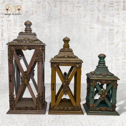 Three handcrafted Royal Heritage Lanterns in different sizes, showcasing ornate details and antique finishes.