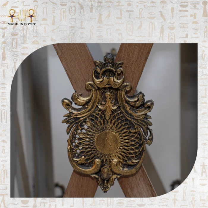 Golden ornamental medallion detail on the Royal Heritage Lantern’s wooden frame.