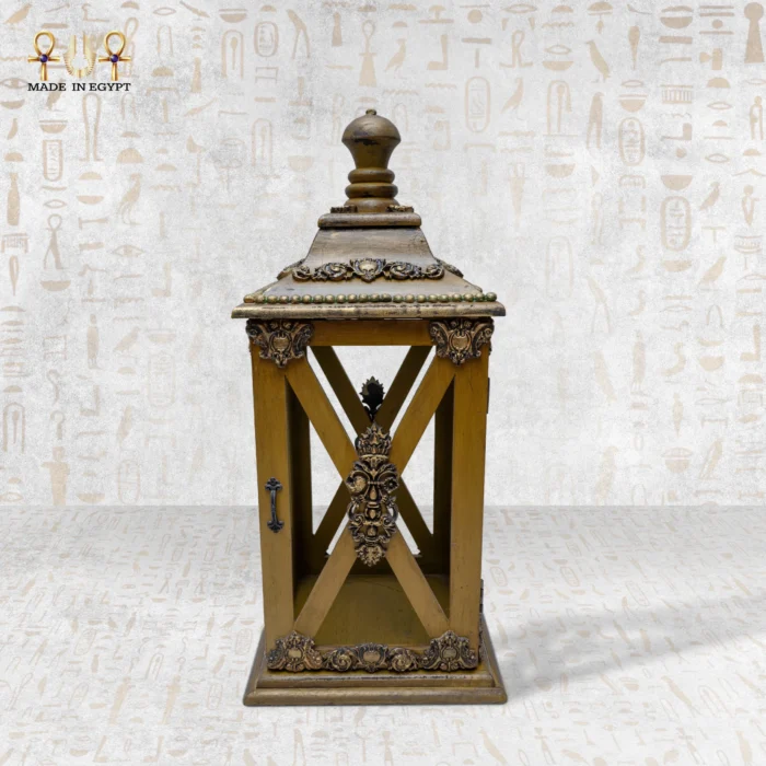 Medium-sized handcrafted wooden lantern with ornate golden details.