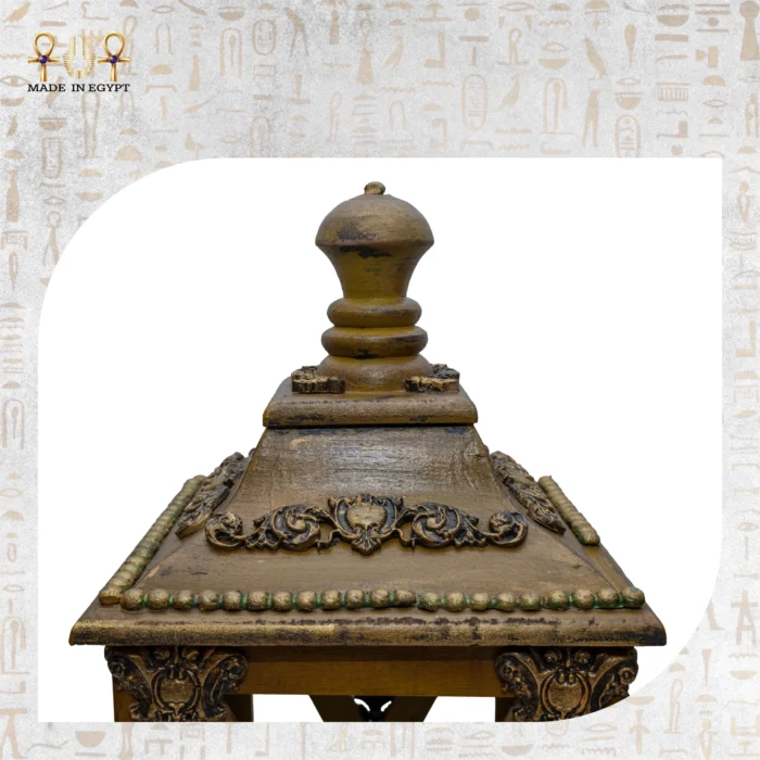 Hand-carved top of the medium Royal Heritage Lantern with golden accents.