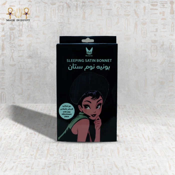Satin Magic sleeping bonnet packaging front view – black design with cartoon illustration.