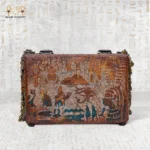 Back side of Secret of the Pharaonic Scarab bag with carved hieroglyphs and Eye of Horus.