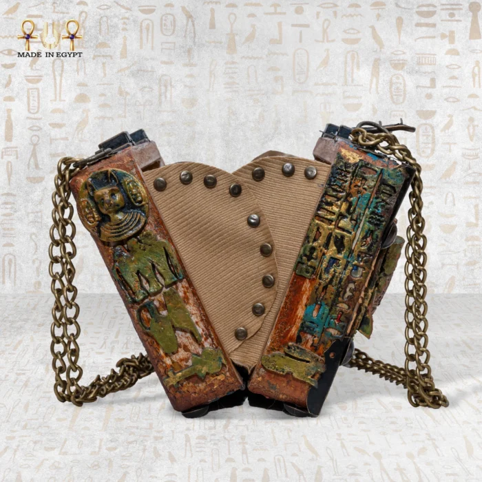 Open view of Secret of the Pharaonic Scarab wooden bag showing inner lining and side engravings.