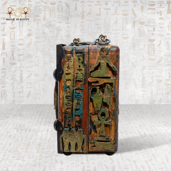 Side view of Secret of the Pharaonic Scarab bag with ankh and ancient Egyptian symbols.