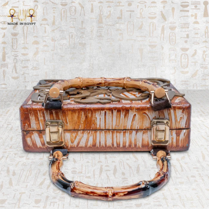 Handcrafted wooden handbag with bamboo handles laid flat