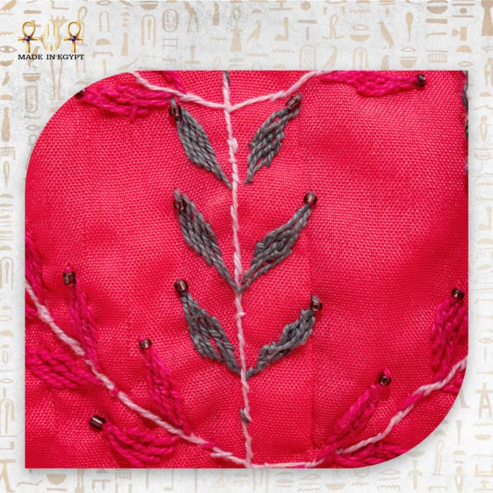 Close-Up of Floral Embroidery on Spring Blossom Bag - Detailed Red and Green Threads