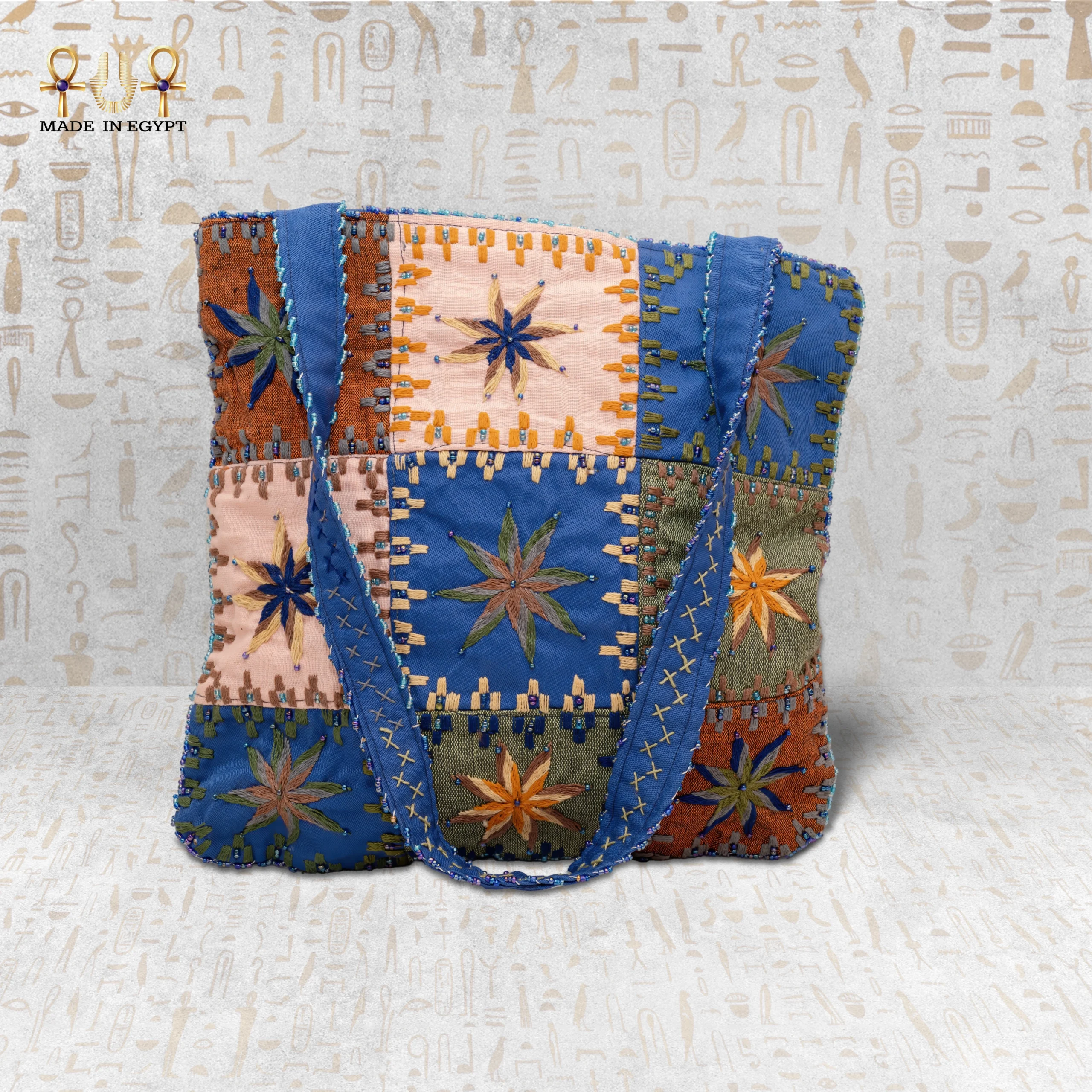 Star Ornament Handcrafted Handbag – Durable Fabric & Modern Design Star Ornament handcrafted handbag made from durable fabric, featuring vibrant star embroidery and modern design with spacious interior.