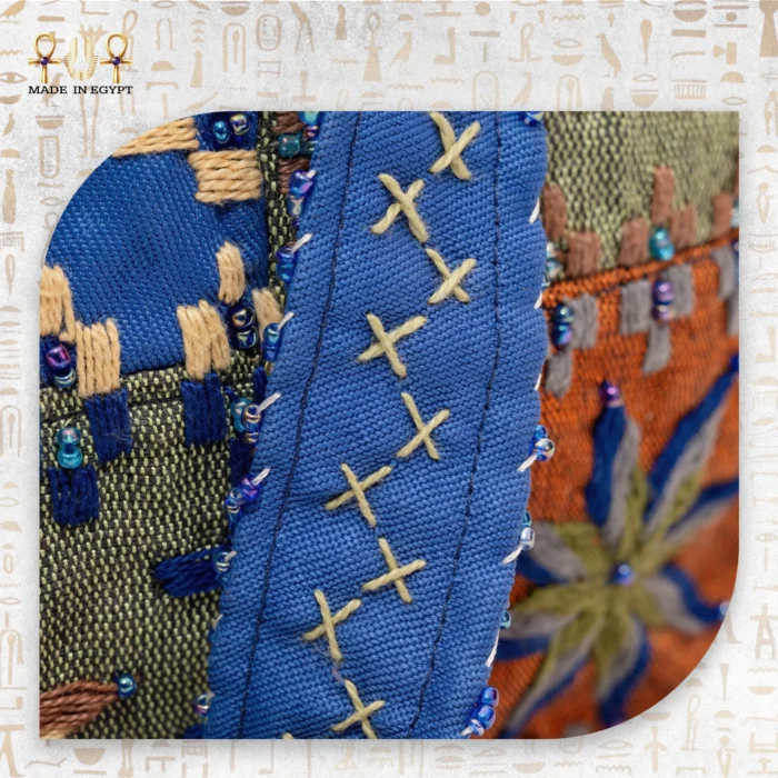 Star Ornament handcrafted handbag with blue star embroidery, made from durable fabric with a modern design and spacious interior.