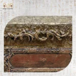 Close-up of ornate embossed detailing on the Sultana bag’s lid, inspired by royal “shakmagia” chests.