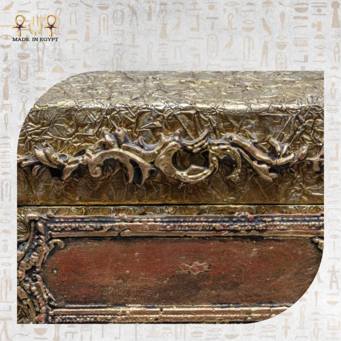 Close-up of ornate embossed detailing on the Sultana bag’s lid, inspired by royal “shakmagia” chests.