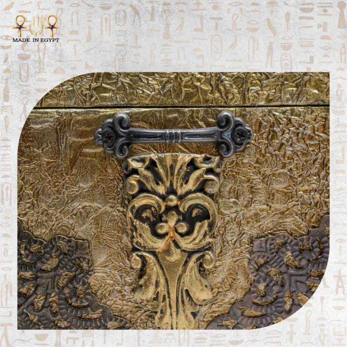 Detailed view of the Sultana bag’s ornate side handle and golden motifs, showcasing handcrafted Egyptian artistry.
