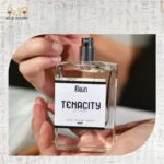Tenacity fragrance bottle with refined feminine design