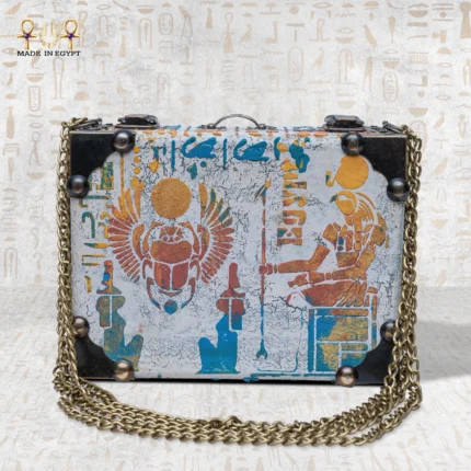 The Secret of Eternity bag front view with winged scarab and ancient Egyptian sun symbol