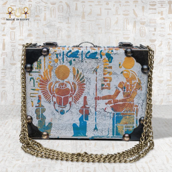 The Secret of Eternity bag front view with winged scarab and ancient Egyptian sun symbol
