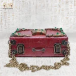Flat view of The Zodiac Sage handcrafted wooden bag with antique brass locks and decorative green details.