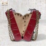 Side and open view of The Zodiac Sage handcrafted red wooden bag showing interior design and brass chain.