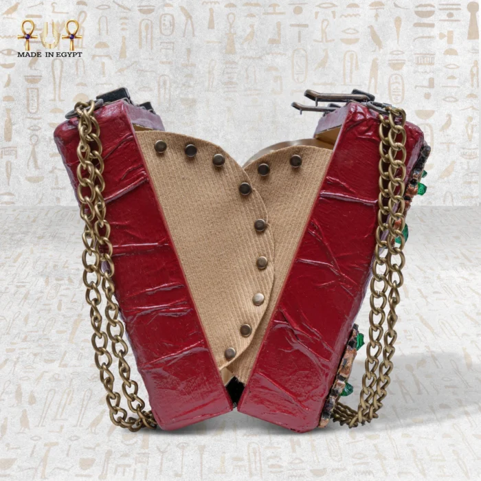 Side and open view of The Zodiac Sage handcrafted red wooden bag showing interior design and brass chain.